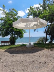 yuvarlak bahce otel plaj semsiyesi - cream colour round sun parasols - umbrellas sun on the beach made by Fam Umbrella