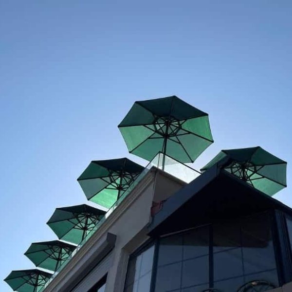 yuvarlak bahce otel plaj semsiyesi - green colour round sun parasols - umbrellas sun on terrace made by Fam Umbrella