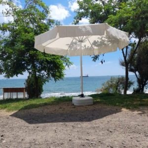 yuvarlak bahce otel plaj semsiyesi - cream colour round sun parasols - umbrellas sun on the beach made by Fam Umbrella